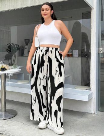 بنطلون نسائي من SHEIN EZwear بمقاسات كبيرة بطبعة حمار وحشي مع رباط خصر وساق واسعة
