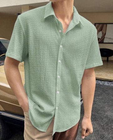 قميص رجالي فضفاض بأزرار بلون سادة من Manfinity Homme