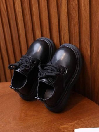 1 زوج أحذية جلدية مصنوعة من البولي يوريثان لللأطفال مع نعول مانعة للانزلاق وإغلاق بالأربطة