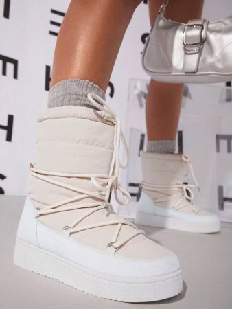 حذاء نسائي من SHUZIA برباط حول الجزء العلوي من الحذاء المستدير من النايلون باللون البيج مناسب لعطلة رأس السنة