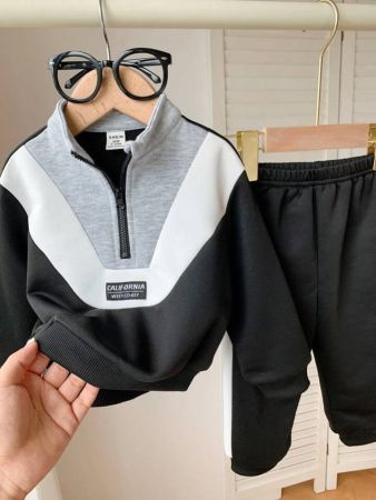 طقم ملابس أطفال من SHEIN مكون من قطعتين من هودي وبنطال رياضي بأكمام طويلة بألوان متعددة، وبطانة حرارية دافئة، مناسب للاستخدام اليومي والنزهات والمدرسة